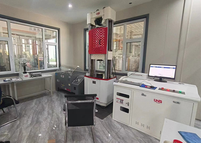 Tensile testing machine for testing the mechanical properties of materials